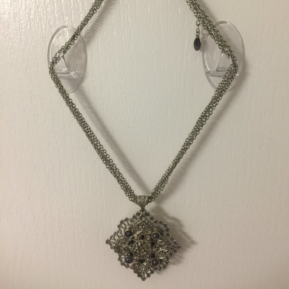 Multi silver chain necklace with silver pendants